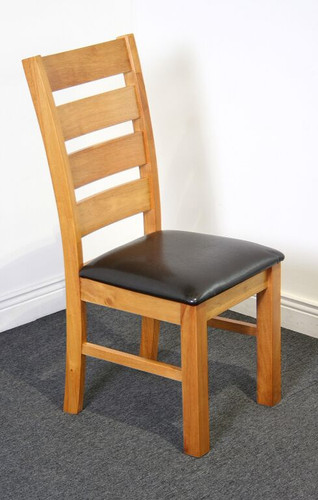 Columbia Chair

Solid Havea Wood Oak Colour 

with a Dark Brown Faux Leather Seat

W46cm x D50cm x H110cm
