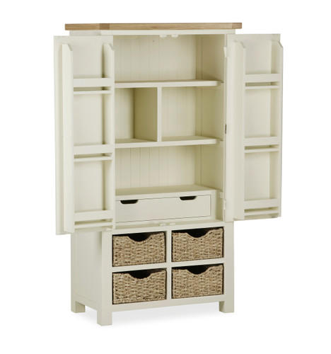 This painted furniture collection in dining and occasional is lacquered in a soft buttermilk colour and paired with beautifully oiled oak tops. The accents of handcrafted water hyacinth baskets and silver satin finished handles, gives the collection a blend of contemporary and country styles