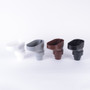 The colour range of the downpipe leaf catchers: White, Grey, Brown Black.