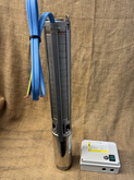 Ward submersible bore pump with starter box and motor and pump end.