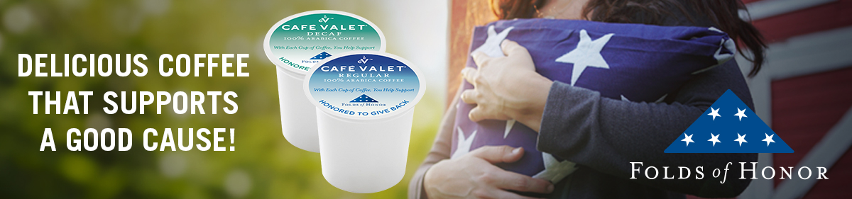 Café Valet coffee pods with woman holding folded US flag in background