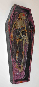 Skeleton in a coffin by George Borum