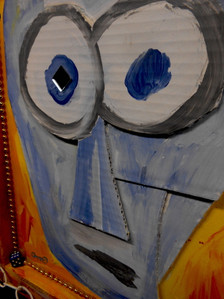 Close-up showing corrugated cardboard construction
Left eye has a Mirror attached