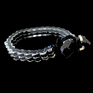 Handmade mens bracelet with leather, blue cord and vintage leather button