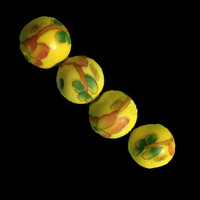 Yellow beads getting ready to become a handmade necklace