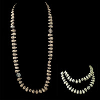 "Heads Up" Vintage one-of-a-kind necklace Designed by Batya exclusively for Lisa Todd boutique in Boca Raton, FL; can be worn as long single strand or doubled up.