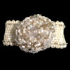 One-of-a-kind beaded flower focal on ivory and white beaded bridal bracelet
