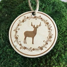 Reindeer surrounded by a wreath wood holiday ornament
