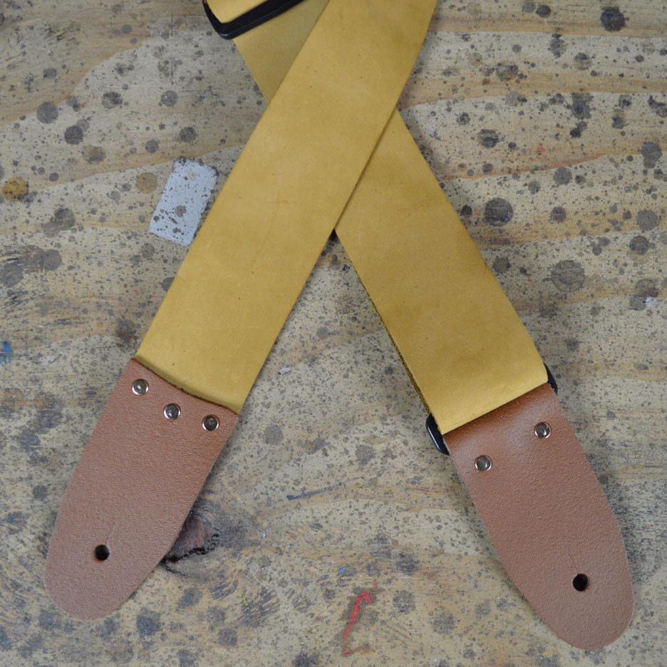 50mm leather guitar strap. Slide adjustable in length from 80cm to