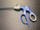 Handle photo of Snowden-Pencer SP90-1253 Laparoscopic Reposable Scissors Handle, 5mm X 45cm