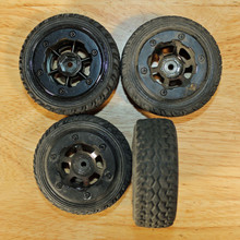 1.9 Axial Plastic bead lock set w/ glued rubber tires - Used