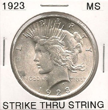 1923 Peace Dollar Strike Thru String MS