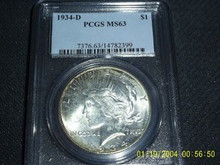 1934-D Peace Silver Dollar PCGS MS 63 Touch of Color $1