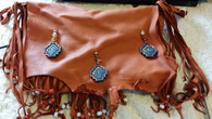 These are leather purses that i can custom make.  They are made of deerskin, pigskin and sometimes with fur.  The basic one's pictures start at $77.00 but i can add beadwork and other embellishments for an additional cost. 

I also can make men's possible bags.  