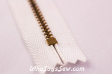 YKK Closed-Ended Gold Metal Zipper with Regular Pull.