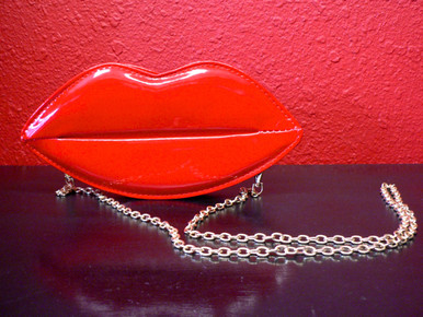 Smooch Patent Leather Purse In Rockin Red as an over the shoulder chain purse