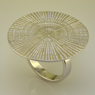 Make a fashion statement with this stylish sterling silver spiral ring, protected with a brilliant white rhodium plating. A generous 1 1/8 inches in diameter. 

Finger Size 7. Also available in Sizes 6 1/4, 7 1/2, and 8 1/4 by Special Order. Please call for Delivery Date.

Beautifully handcrafted in Northern, Spain.