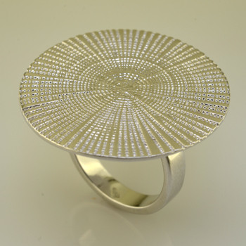 Make a fashion statement with this stylish sterling silver spiral ring, protected with a brilliant white rhodium plating. A generous 1 1/8 inches in diameter. 

Finger Size 7. Also available in Sizes 6 1/4, 7 1/2, and 8 1/4 by Special Order. Please call for Delivery Date.

Beautifully handcrafted in Northern, Spain.
