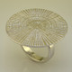 Make a fashion statement with this stylish sterling silver spiral ring, protected with a brilliant white rhodium plating. A generous 1 1/8 inches in diameter. 

Finger Size 7. Also available in Sizes 6 1/4, 7 1/2, and 8 1/4 by Special Order. Please call for Delivery Date.

Beautifully handcrafted in Northern, Spain.