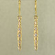 When you need just a touch of sparkle to jazz up your wardrobe, these 14 karat Yellow Gold diamond earrings are perfect. They are a perfect blend of traditional, and modern, to work with any outfit, and give you a confident feel, wether you are dressed up or dressed casual. Set with .12ct T.W. of Ideal cut Diamonds, with lever backs. Earrings measure 1 1/2 inches long.

Designed, and created in our studio by the artist Stuart J.