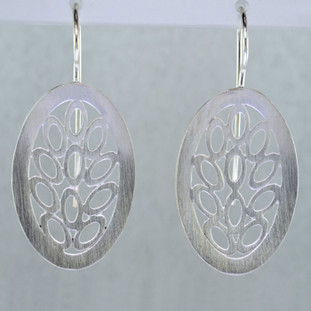These oval, scalloped filagree design Sterling Silver earrings will make you shine in any outfit. Wear them with your jeans or for an evening out. With Sterling Silver ear wires. Measure 1 3/16 inches.

Handmade in Istanbul, Turkey.