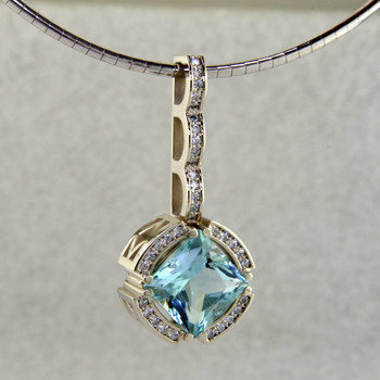 For an important occasion, you need an important, custom made, killer pendant. Like this one! Look closely and you will see the amazing detail, intricately carved into this 14 karat white gold pendant. The center piece of this masterpiece is a magnificant 4.58ct. princess cut Mint colored Beryl, custom cut for us by the famed stone cutters in Idar-Oberstein, Germany. Beryls come in many colors, the most familiar of which is green, which is Emerald. However the other colors are just as enticing, and much more unique. This fabulous gemstone is accented with .35ct. T.W. of Ideal cut Diamonds. Includes a 14 karat White Gold, 2mm round omega wire, 16 inches long.
Designed, and created in our studio by the artist Stuart J.