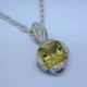 Eye-catching modern pendant with a traditional twist. Sculpted in 14 karat White Gold with a spectacular, one-of-a-kind 5.42ct. princess cut Yellow Beryl, custom cut for us by the famed stone cutters in Idar-Oberstein, Germany. Beryls come in many colors, the most familiar of which is green, which is Emerald. However the other colors are just as enticing, and much more unique. This fabulous gemstone is accented with .29ct. T.W. of Ideal cut Diamonds, and includes a 14 karat White Gold open link chain, 18 inches long. Pendant measures 1 1/8 inches long.
Designed, and created in our studio by the artist Stuart J. Eye-catching modern pendant with a traditional twist. Sculpted in 14 karat White Gold with a spectacular, one-of-a-kind 5.42ct. princess cut Yellow Beryl, custom cut for us by the famed stone cutters in Idar-Oberstein, Germany. Beryls come in many colors, the most familiar of which is green, which is Emerald. However the other colors are just as enticing, and much more unique. This fabulous gemstone is accented with .29ct. T.W. of Ideal cut Diamonds, and includes a 14 karat White Gold open link chain, 18 inches long. Pendant measures 1 1/8 inches long.
Designed, and created in our studio by the artist Stuart J.