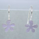 Sweet flower earrings in sterling silver hanging on wires. Measures  3/4" long.  Hand crafted in Istanbul.
