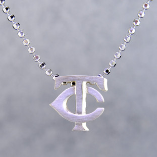 Inspired by today's modern woman, each pendant representing the 30 MLB teams captures the heart and spirit of every city and fan. Little Minnesota Twins pendant in solid Sterling Silver measures 1/2 inch long, and comes on a sparkling sterling silver ball chain, 18 inches long. Also available in 14 karat Yellow and Rose gold. What's your favorite team?

Designed and handcrafted by Alex Woo in New York City.