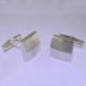 These solid Sterling Silver cufflinks look modern and sophisticated. Hand finished with a classic square shape, and light textured finish for an understated, but distinctive look. Measures 5/8 inch.

by David Heston of San Rafael, California.