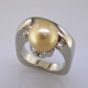 This one-of-a-kind Tahitian Pearl ring is truly a masterpiece. Modern, and elegant, this 14 karat white gold ring gently holds a spectacular 9.7mm golden colored Tahitian Pearl, framed by 2 round Ideal cut Diamonds totaling .20ct. Finger size 6. We can size it up or down about 1.5 sizes, or it can be special ordered in your finger size. Measures 3/4 inch wide.
Designed, and created in our studio by the artist Stuart J. This one-of-a-kind Tahitian Pearl ring is truly a masterpiece. Modern, and elegant, this 14 karat white gold ring gently holds a spectacular 9.7mm golden colored Tahitian Pearl, framed by 2 round Ideal cut Diamonds totaling .20ct. Finger size 6. We can size it up or down about 1.5 sizes, or it can be special ordered in your finger size. Measures 3/4 inch wide.
Designed, and created in our studio by the artist Stuart J.