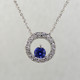 This beautiful one-of-a-kind circle pendant is a classic, timeless design. Crafted in 14 karat white gold, with .17ct. T.W. Ideal cut diamonds encircling an exquisite cornflower blue Sapphire gemstone measuring 4mm. Includes a 14 karat white gold sparkle wheat chain, 16 inches long.

Designed, and created in our studio by the artist Stuart J.