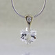 The hottest snowflake around! Custom cut, exclusively for us, in Canada. Dangling from a 14 karat white gold Piercette® pendant, with a perfectly cut sparkling 8mm Colorless Topaz snowflake cut gemstone, and accented with a single .03ct. Ideal cut Diamond. Includes a 14k white gold 1mm diameter, smooth snake chain, 16 inches long. Measures 1/2 inch long.
Designed and handmade by the artist Stuart J.
A Piercette® is a patented method of setting, with a gemstone that moves. The gem is set so that it swivels with every movement of the wearer, exhibiting extra sparkle. The hottest snowflake around! Custom cut, exclusively for us, in Canada. Dangling from a 14 karat white gold Piercette® pendant, with a perfectly cut sparkling 8mm Colorless Topaz snowflake cut gemstone, and accented with a single .03ct. Ideal cut Diamond. Includes a 14k white gold 1mm diameter, smooth snake chain, 16 inches long. Measures 1/2 inch long.
Designed and handmade by the artist Stuart J.
A Piercette® is a patented method of setting, with a gemstone that moves. The gem is set so that it swivels with every movement of the wearer, exhibiting extra sparkle.