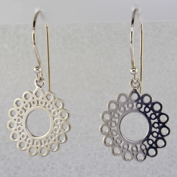Designed, and created in our studio by the artist Stuart J., these airy earrings are fun for day or night. Handcrafted in Sterling Silver, hanging on wires. They measure 1 1/4 inches long.