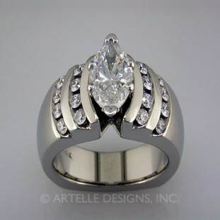 Wed 8 - Custom designed marquise diamond engagement ring.