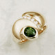 You will be so stylish in this one of a kind gemstone ring, crafted in 14 karat yellow gold, with a dreamy deep green .98ct. oval Chrome Tourmaline, accented with .15ct .T.W. ideal cut diamonds. Beautifully finished with a contrasting satin treatment, for a sophistcated look. Finger size 6. Designed, and created in our studio by the artist Stuart J.