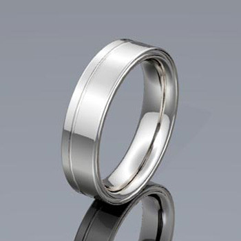 For the simple but modern guy, this gold or platinum wedding ring is perfectly styled. This custom made wedding ring is designed to be Perfectly You, and takes about 3-5 weeks to create.  Call us for more information about how we can make this design Just For You. Designed, and created in our studio by the artist Stuart J.