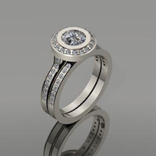 Timeless and modern diamond halo engagement ring and matching diamond wedding ring.

This elegant diamond engagement ring can be made in any karat or color of gold, and in platinum.

This custom designed engagement ring is individually crafted to be Perfectly You, and takes about 3-5 weeks to create. Call us for more information about how we can customize this design Just For You. Designed, and created in our studio by the artist Stuart J.