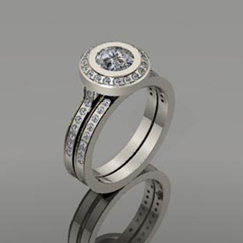 Timeless and modern diamond halo engagement ring and matching diamond wedding ring.

This elegant diamond engagement ring can be made in any karat or color of gold, and in platinum.

This custom designed engagement ring is individually crafted to be Perfectly You, and takes about 3-5 weeks to create. Call us for more information about how we can customize this design Just For You. Designed, and created in our studio by the artist Stuart J.