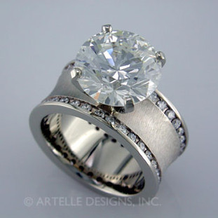 Spectacular, wide, diamond engagement ring, in gold or platinum. 

This contemporary diamond engagement ring will really make you feel special, and can be made in gold or platinum. With a wide band and cascading ideal cut diamonds, this will make a great anniversary gift for 20, 30 or more years together.

This custom designed diamond engagement ring is individually crafted, to be Perfectly You, and takes about 3-5 weeks to create. Call us for more information about how we can customize this design Just For You. Designed, and created in our studio by the artist Stuart J.