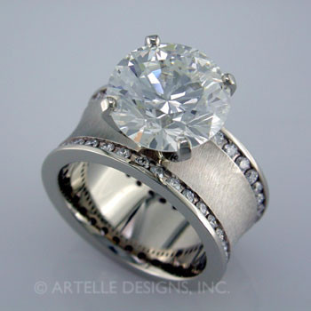 Spectacular, wide, diamond engagement ring, in gold or platinum. 

This contemporary diamond engagement ring will really make you feel special, and can be made in gold or platinum. With a wide band and cascading ideal cut diamonds, this will make a great anniversary gift for 20, 30 or more years together.

This custom designed diamond engagement ring is individually crafted, to be Perfectly You, and takes about 3-5 weeks to create. Call us for more information about how we can customize this design Just For You. Designed, and created in our studio by the artist Stuart J.