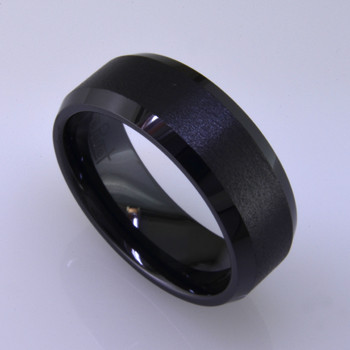 For the innovative and unique man, this men's ring can be for many occasions. Wear it as a wedding ring, or just a stylish everyday fashion statement ring. This ring is ultra durable for the guy who plays rough. And no charge for re-sizing. This ring is black ceramic, with a flat bevel edge, a brushed finish center, and polished edges. Ring shown is 8mm wide and a size 10, but call us with your finger size and we will make it just for you. Usually within just a few days.

This ring is hypoallergenic, and environmentally friendly. Made with Gem Ceramique, this ring uses high tech zirconia ceramic, virtually as hard as sapphire. Ultra durable and stylish, versatile and unique. It even has a Lifetime "Peace of mind" warranty against breakage.  

Created by award winning jewelry artist Etienne Perret, and made in his studio in Camden, Maine.