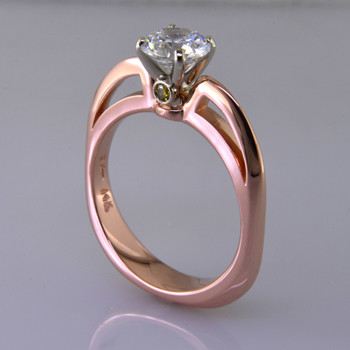 This beautiful engagement ring design with its simple, clean lines frames your diamond perfectly. The bottom has soft rounded corners for the ultimate comfort. This is a contemporary, but timeless design.  

This elegant diamond engagement ring is priced in 14k white gold, and can be made in any karat or color of gold, and in platinum. This one is shown with a 1 carat round brilliant cut center (sold seperately), but we will make it for any size or shape gem. For a little extra sparkle, we added 2 yellow diamonds to the sides of the crown. A matching shadow wedding ring or a diamond wedding ring is available.

This custom designed engagement ring is individually crafted to be Perfectly You, and takes about 2 weeks to create. Call us for more information about how we can customize this design Just For You. Designed, and created in our studio by the artist Stuart J.