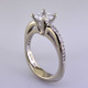 This beautiful diamond engagement ring design with its simple, clean lines frames your diamond perfectly. The bottom has soft rounded corners for the ultimate comfort. This is a contemporary, but timeless design.
This elegant diamond engagement ring is priced in 14k white gold, and can be made in any karat or color of gold, and in platinum. Set with .17ct. of ideal cut diamonds, this one is shown with a 1 carat princess cut center (sold seperately), but we will make it for any size. A matching shadow wedding ring or a diamond wedding ring is available.
This custom designed engagement ring is individually crafted to be Perfectly You, and takes about 2 weeks to create. Call us for more information about how we can customize this design Just For You. Designed, and created in our studio by the artist Stuart J. This beautiful diamond engagement ring design with its simple, clean lines frames your diamond perfectly. The bottom has soft rounded corners for the ultimate comfort. This is a contemporary, but timeless design.
This elegant diamond engagement ring is priced in 14k white gold, and can be made in any karat or color of gold, and in platinum. Set with .17ct. of ideal cut diamonds, this one is shown with a 1 carat princess cut center (sold seperately), but we will make it for any size. A matching shadow wedding ring or a diamond wedding ring is available.
This custom designed engagement ring is individually crafted to be Perfectly You, and takes about 2 weeks to create. Call us for more information about how we can customize this design Just For You. Designed, and created in our studio by the artist Stuart J.
