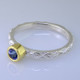 This cool, hip, and fun stackable ring is the start of your new collection. This ring will have many different looks when you stack it with other rings, or enjoy it alone in your everyday style. Hand finished in Sterling sliver with an 18 karat yellow gold bezel holding a beautiful 4.0mm round buff top tanzanite. Finger size 7. We will make this in any size you need in about ten days.

Designed, and created in our studio by the artist Stuart J.

This ring is also shown in other gemstone colors and sizes, which are sold separately, and can be stacked with all other rings in our stackables collection. You can also stack it with any ring you like. There are no rules. Call us with your favorite color, and we will customize this Just For You.
