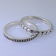 This cool, hip, and fun stackable ring is the start of your new collection. This ring will have many different looks when you stack it with other rings, or enjoy it alone in your everyday style. Hand finished in Sterling sliver with a beautiful ball design. Finger size 7. We will make this any size you need in about 10 days. Band measures 2.5mm wide. 

Designed, and created in our studio by the artist Stuart J.

This ring is also shown with other gemstone colors and sizes, which are sold separately, and can be stacked with all other rings in our stackables collection. You can also stack it with any ring you like. There are no rules. Call us with your favorite color, and we will customize this Just For You.
