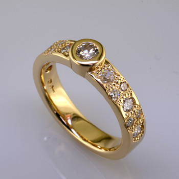  Ladies custom designed Yellow gold diamond engagement bezel ring.  We remade this ring using all her old stones and gold and look how amazing it looks.