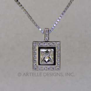 Ladies white gold custom designed diamond halo pendant is elegant and timeless.
