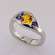 This elegant two color sapphire ring has a low profile, is easy to wear, and super comfy. Priced here in 14 karat white gold with a 1.09 carat sunny yellow round sapphire, and 2 amazing round deep blue sapphires. (We can make it in any metal, and for any size diamond or colored gemstone). This is truly a timeless design, with no prongs to catch. A matching shadow wedding band is also available, if you like this as an engagement ring
This custom designed gemstone ring is individually crafted to be Perfectly You, and is a one of a kind piece. Call us for more information about how we can customize this design Just For You. Designed, and created in our studio by the artist Stuart J. This elegant two color sapphire ring has a low profile, is easy to wear, and super comfy. Priced here in 14 karat white gold with a 1.09 carat sunny yellow round sapphire, and 2 amazing round deep blue sapphires. (We can make it in any metal, and for any size diamond or colored gemstone). This is truly a timeless design, with no prongs to catch. A matching shadow wedding band is also available, if you like this as an engagement ring
This custom designed gemstone ring is individually crafted to be Perfectly You, and is a one of a kind piece. Call us for more information about how we can customize this design Just For You. Designed, and created in our studio by the artist Stuart J.