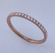 This matching diamond wedding ring to Adelina is an elegant compliment to an already classy engagement ring design.  Lined with .10ct. total weight of brilliant cut diamonds, hand set in 18 karat Rose gold. You can also wear it as a stackable ring, or as is! 

Designed by the acclaimed artist Alishan in his California studio.